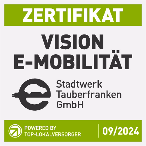 Zertifikat 'Vision E-Mobilität' für die Stadtwerk Tauberfranken GmbH, ausgezeichnet als Top-Lokalversorger für E-Mobilität, gültig bis 09/2024. Grünes und graues Design mit E-Auto-Symbol.