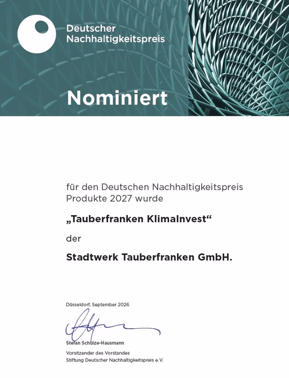 DNP Nominierung Nominierungsurkunde für den Deutschen Nachhaltigkeitspreis Produkte 2027 für „Tauberfranken KlimaInvest“ der Stadtwerk Tauberfranken GmbH.